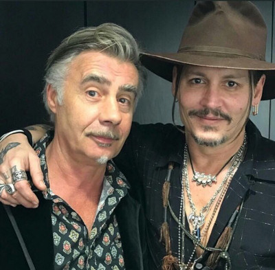 Glen Matlock and Johnny Depp last night at the Shane MacGowan birthday celebration