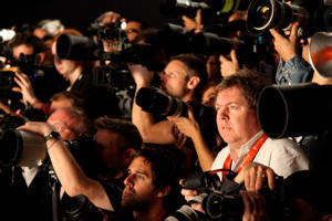 Pete as a photographer in the pit at 2009's London fashion week